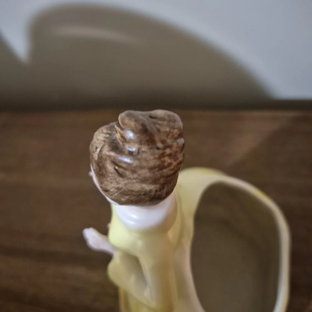 Vintage Yellow Ceramic Figurine